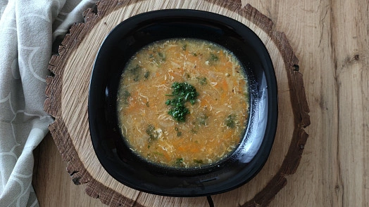 Hot American mixed eggs in a black bowl.