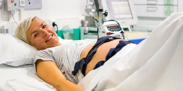 Woman in labor with monitors
