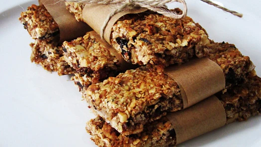 Gluten-free bars stacked with paper bands