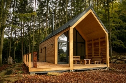 Wooden modular cabin in forest